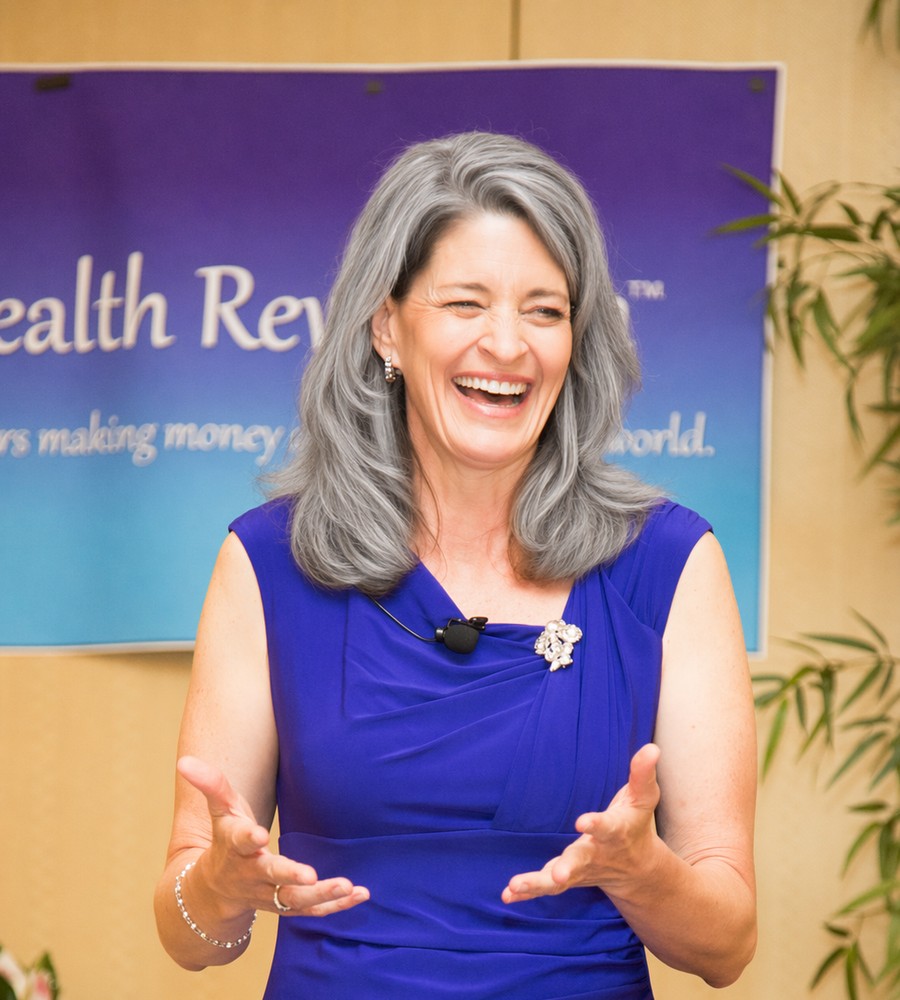 Linda Albright speaking at a Women's Wealth Revolution event